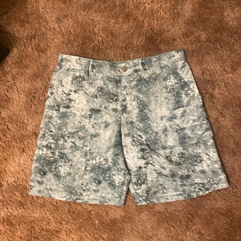 Men’s pair of real legend size 34 board shorts